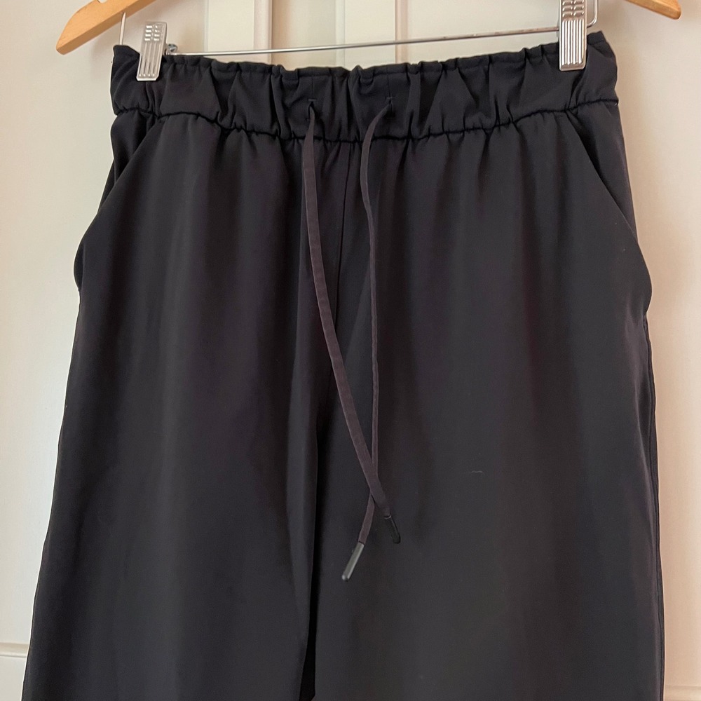 Lululemon On the Fly 7/8 Pant Black Luxtreme High Rise Drawstring Trousers - Picture 2 of 9